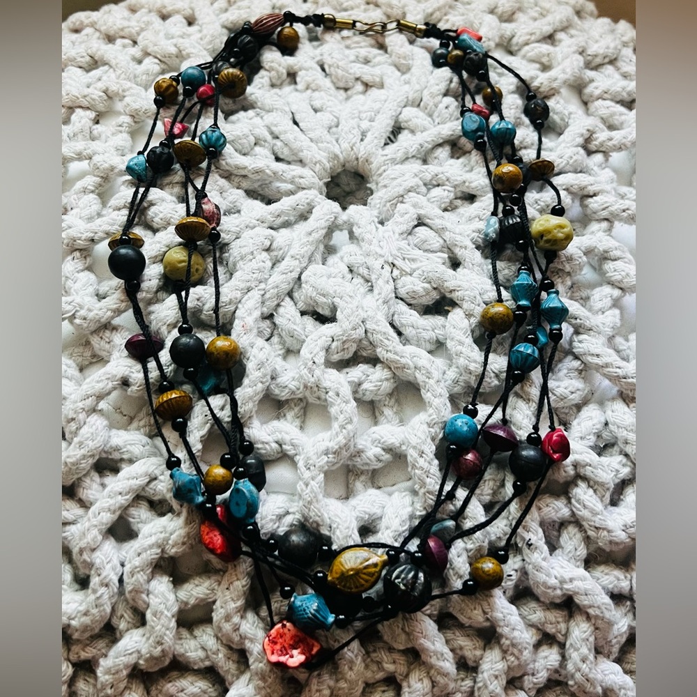 Beautiful 5-strand, multi-colored beaded, 25” necklace and earrings.